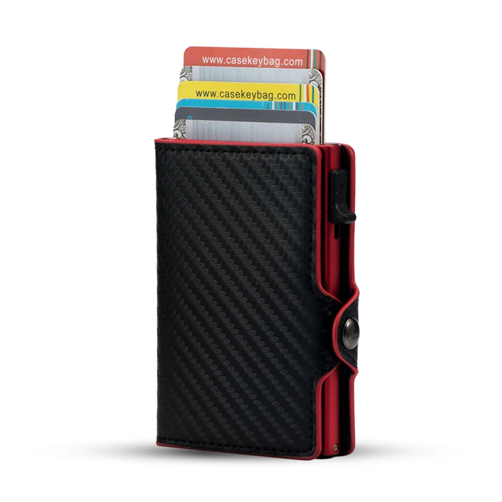 Front view of the black carbon fiber CaseKey wallet highlighted by a striking, vibrant red anodized aluminum alloy edge frame and card lever