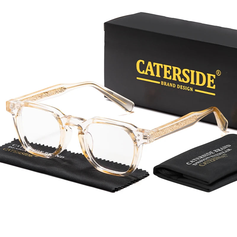 Translucent champagne acetate Caterside optical glasses presented with the brand's black box and cloth.