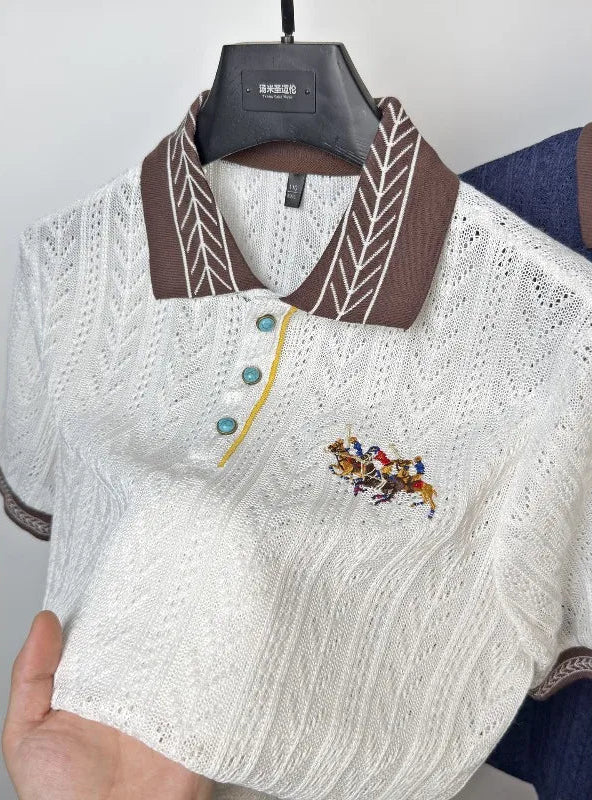 Detailed view of the premium polyester-elastane high-stretch fabric blend on the white embroidered knit polo