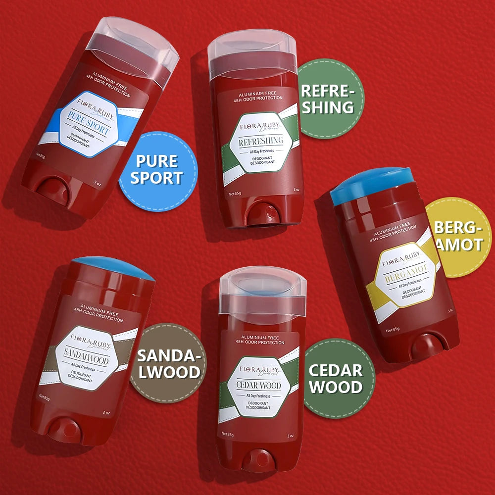 Top-down flatlay view of five red deodorant sticks over a red background with circular labels indicating different wood and sports scents