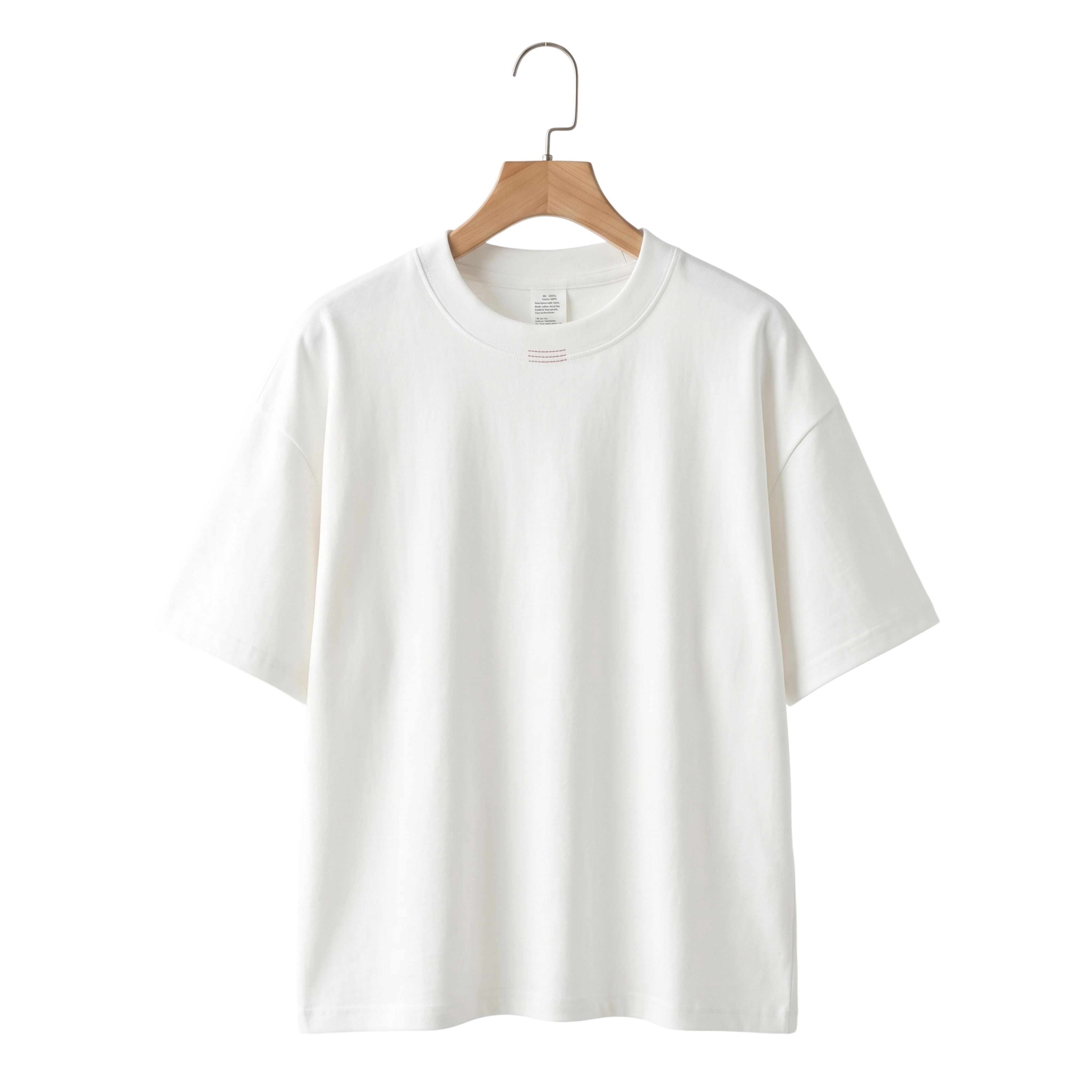 Minimalist thick broadcloth cotton streetwear t-shirt in solid classic white hanging on a natural wooden hanger