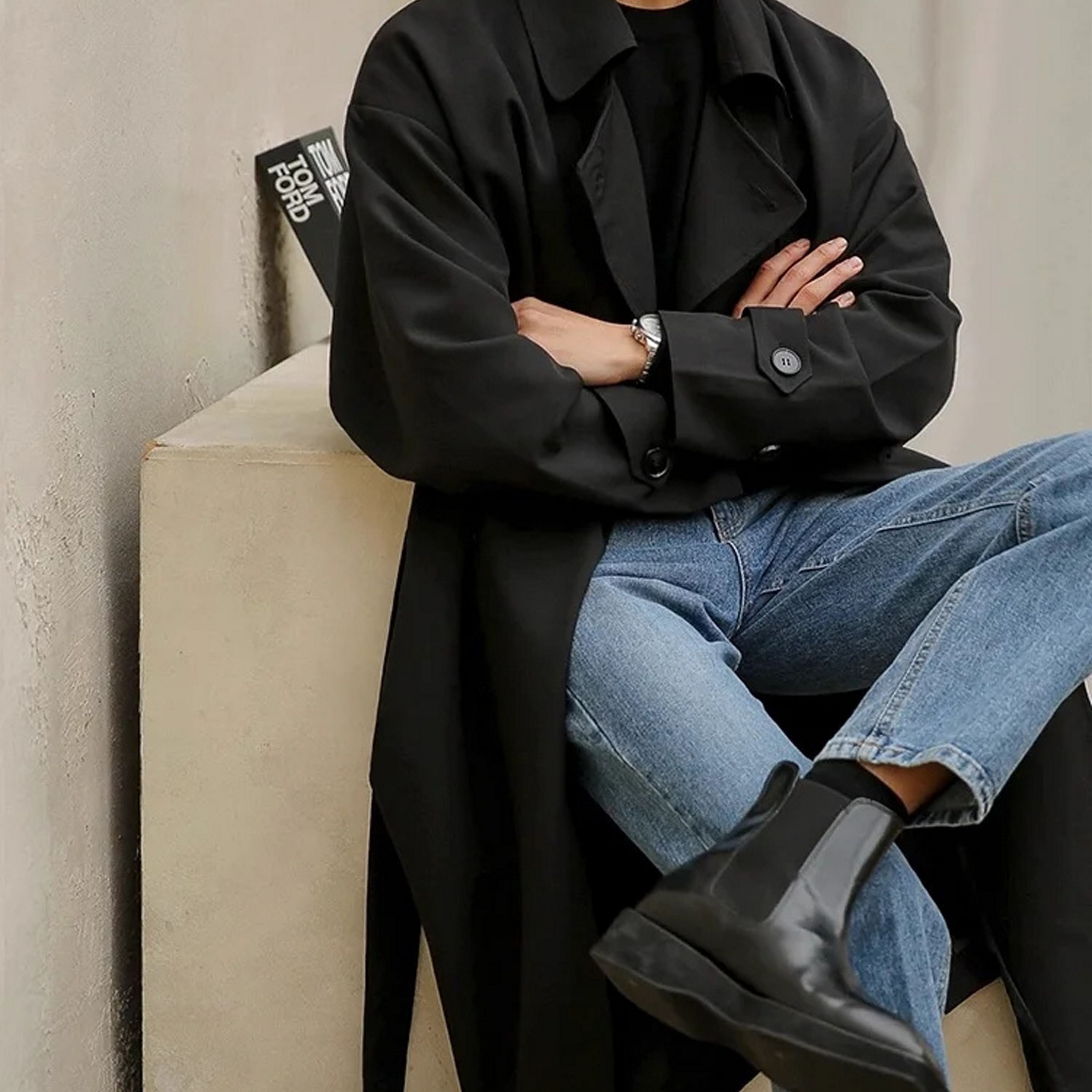 Outfit view of man wearing korean style double breasted black overcoat