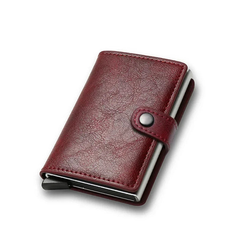 Mini mechanical cardholder wallet wrapped in a sophisticated burgundy red synthetic leather cover with a metal snap fastner