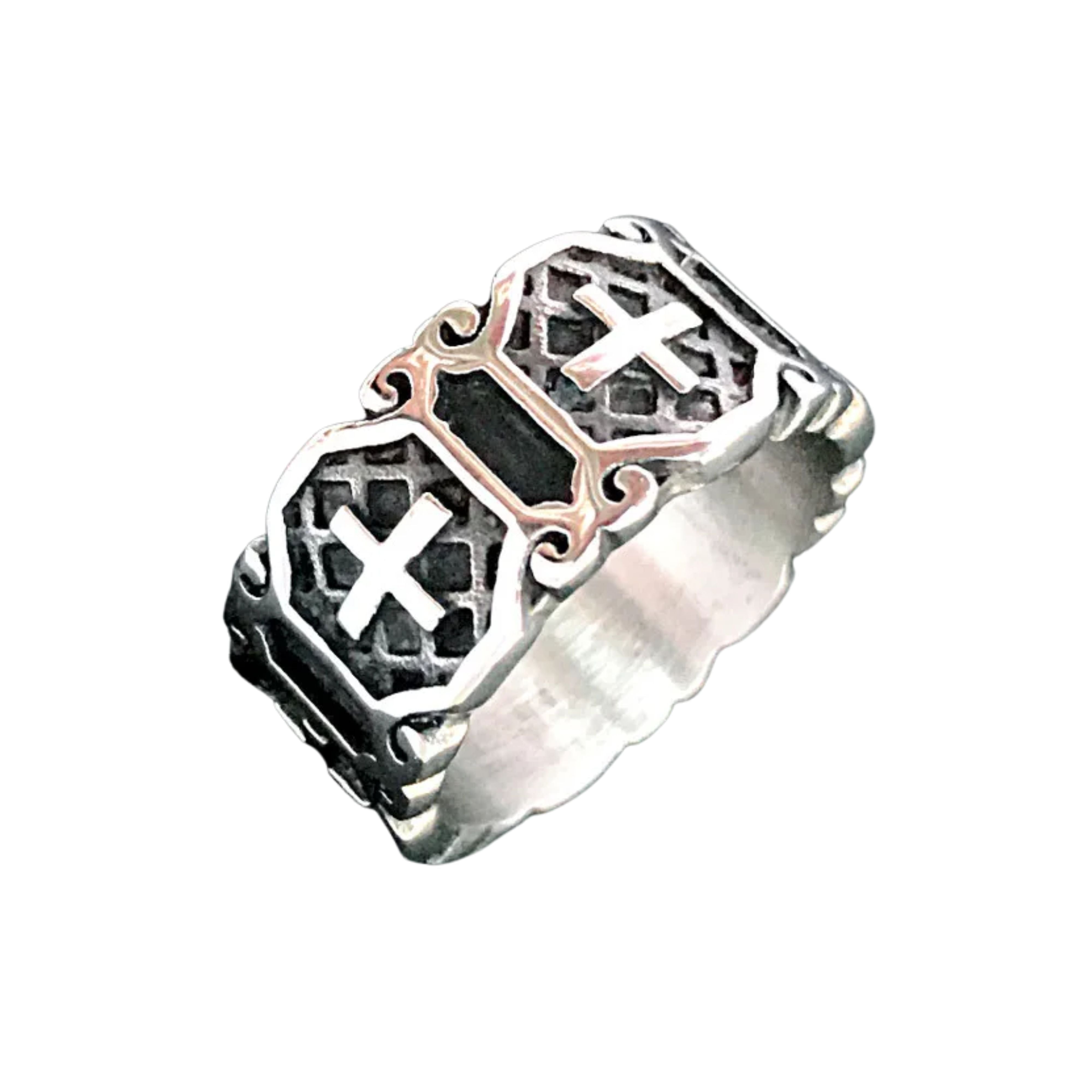 Chunky men's silver band ring featuring a repeating gothic cross pattern with a dark oxidized background on a white surface.