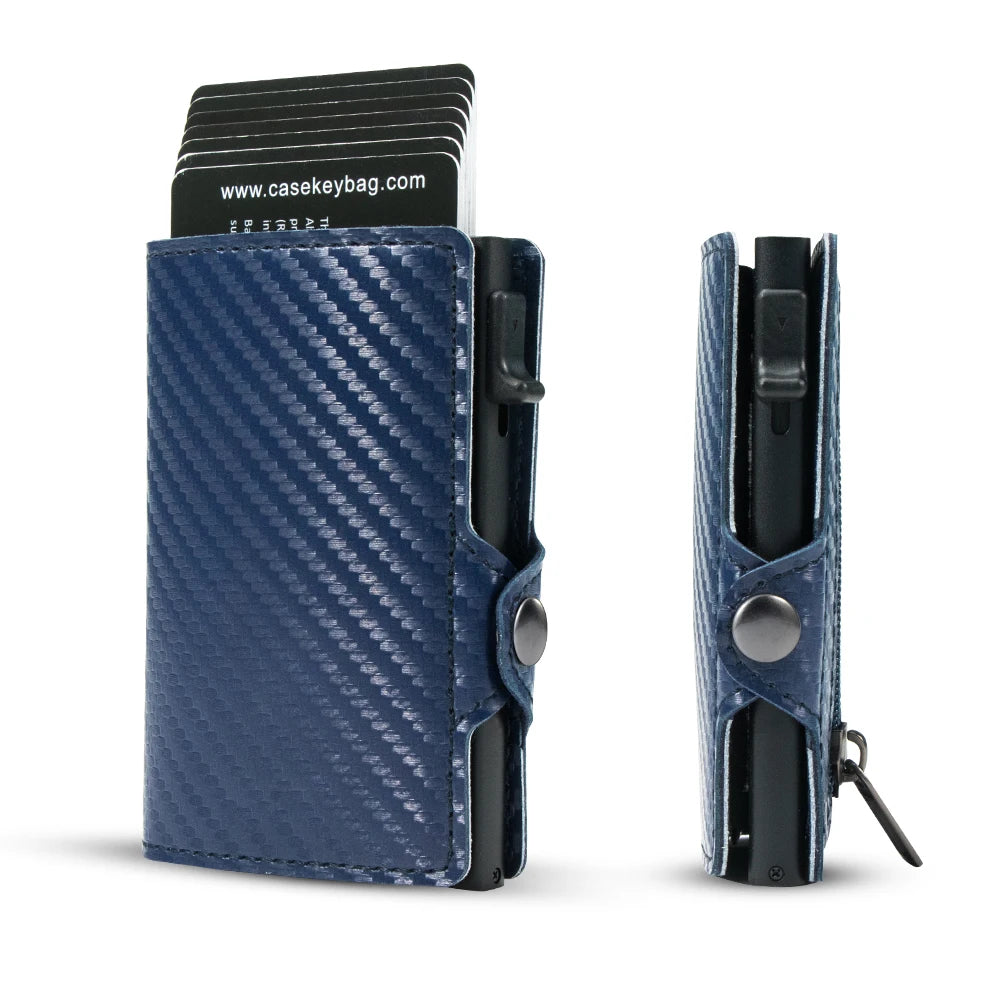 Front and side views of the CaseKey minimalist card holder showcasing a sleek navy blue carbon fiber weave cover with matching blue leather accents