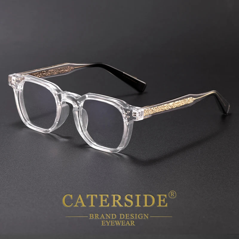 Transparent clear Caterside eyewear frames showcasing gold inner wire core details, set against a dark backdrop.