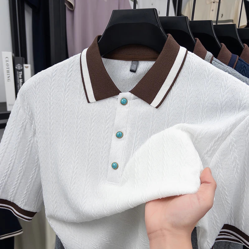 Detailed shot highlighting the lightweight airflow knit pattern and premium soft feel of the white polo shirt