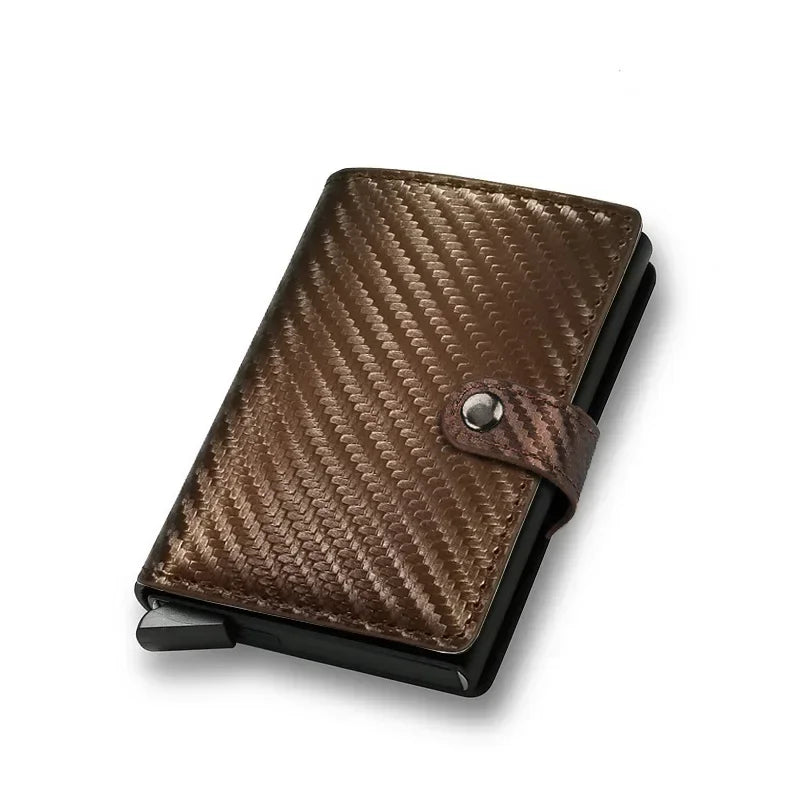 Modern smart wallet variant showcasing a textured bronze brown carbon fiber weave pattern shell and a matching leather closing strap