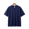 Premium men's heavyweight 425g cotton t-shirt in navy blue, showcasing a structural boxy fit, relaxed half sleeves, and a thick ribbed crew neck on a wooden hanger