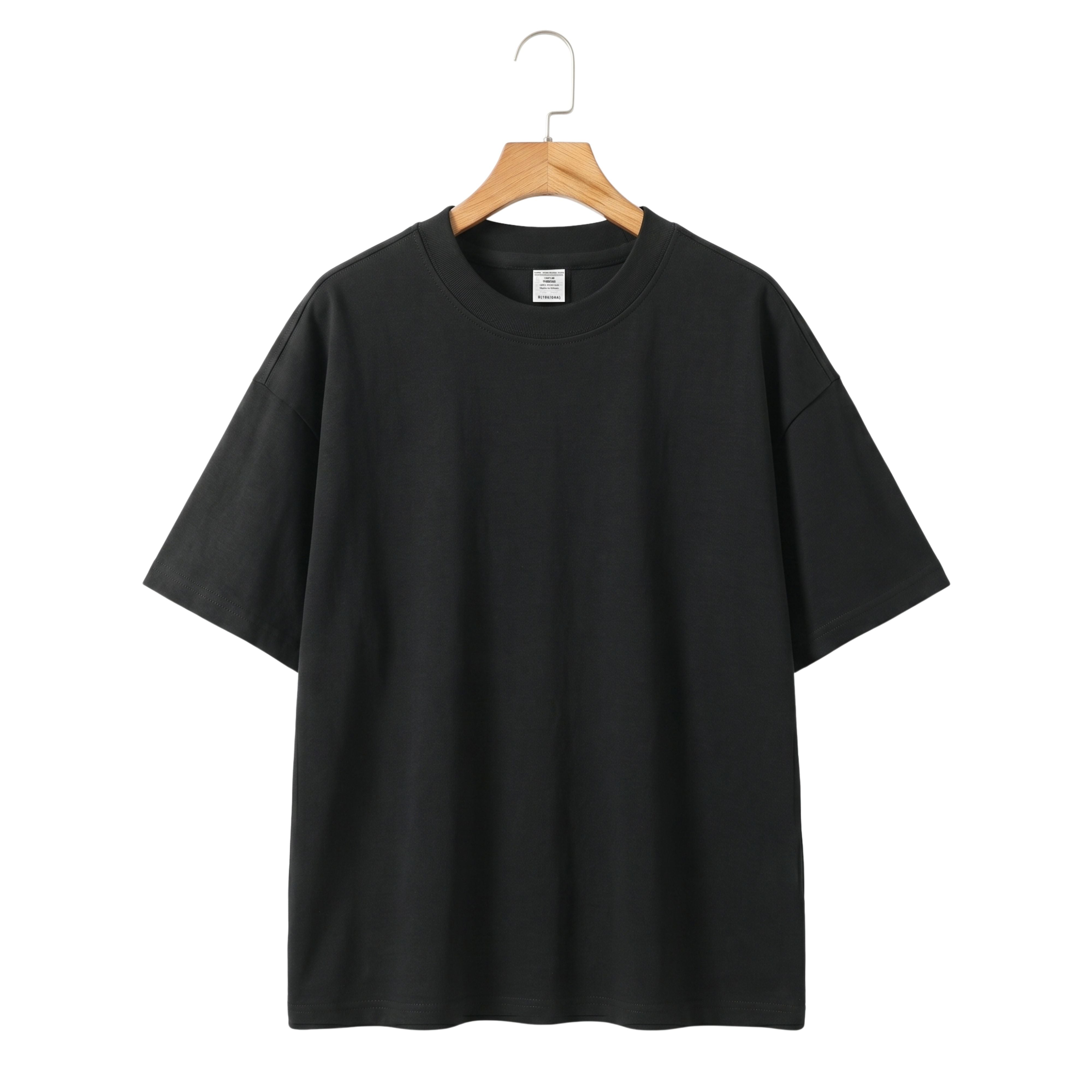 High-quality solid stealth black men's blank t-shirt featuring a durable heavy knit architectural drape profile