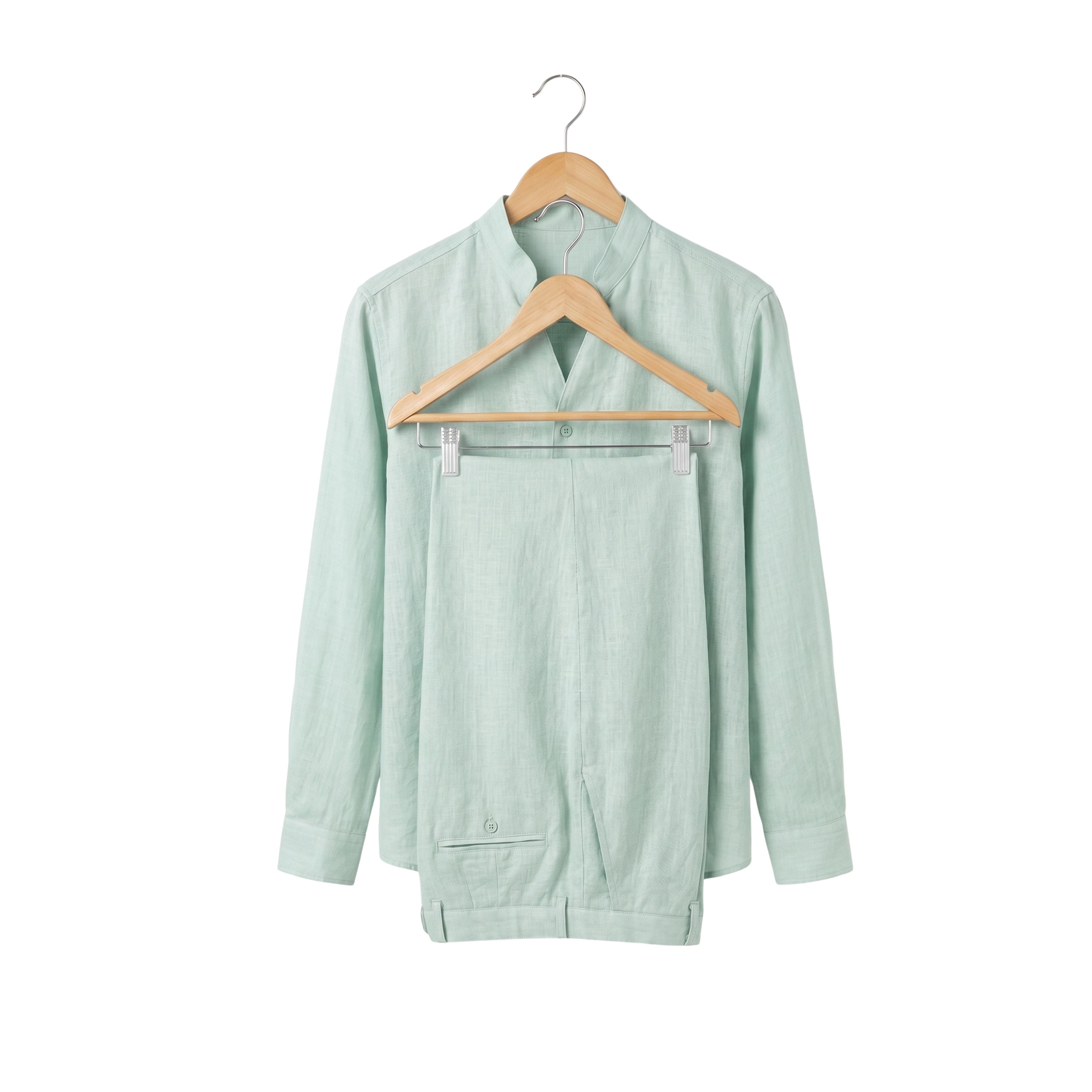 Men's Riviera Coast two-piece coordinated resort set in mint green cotton, featuring a button-down long-sleeve shirt and matching casual trousers on a wooden hanger