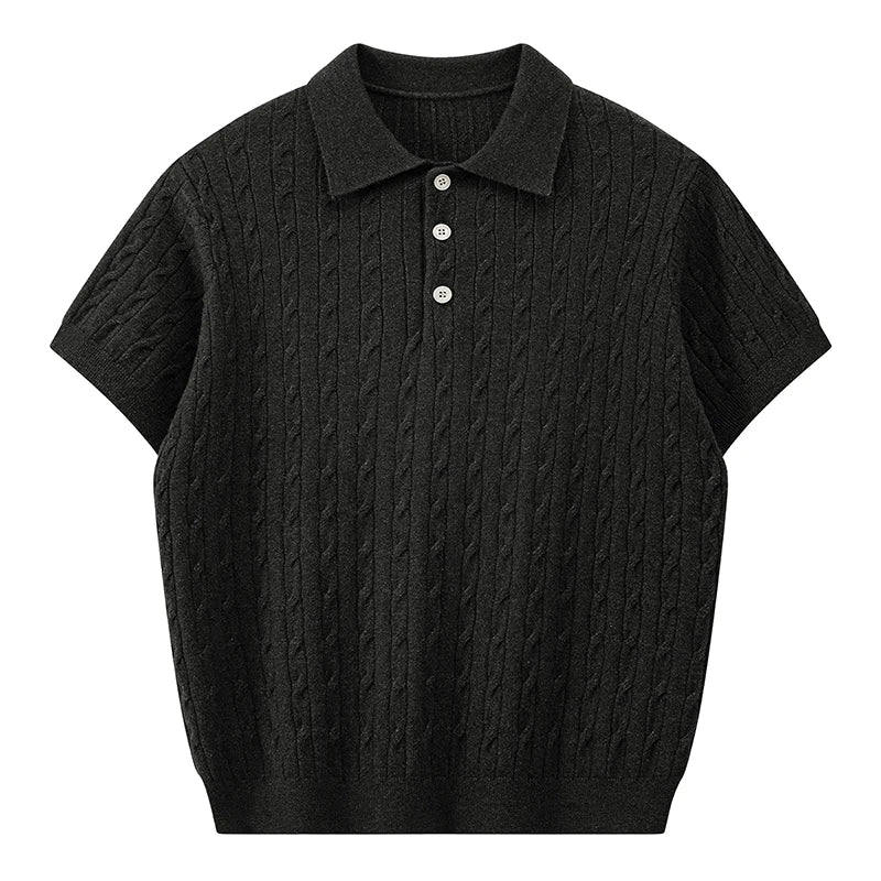 Front view of a classic black men's short-sleeve cable knit polo shirt with matching black buttons.