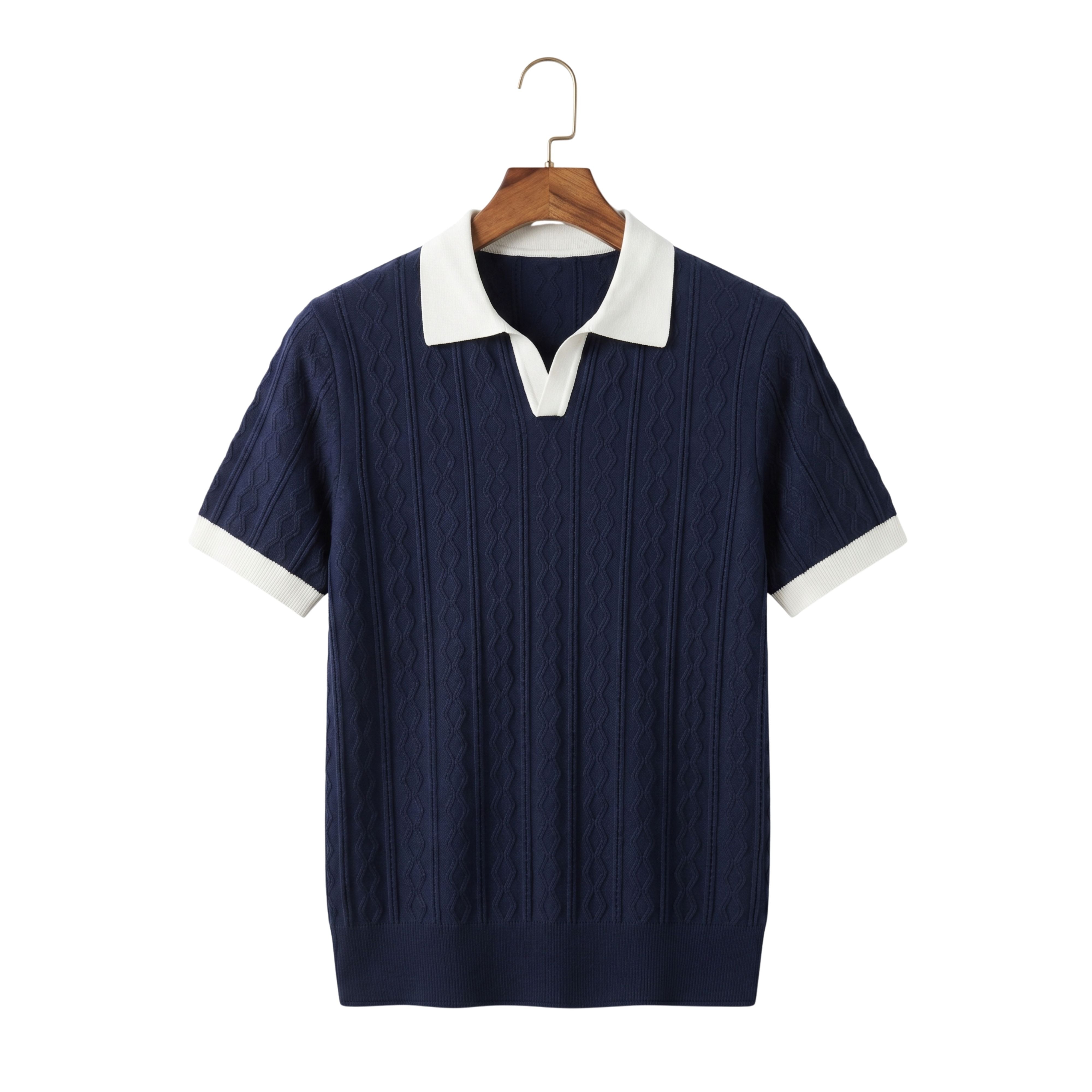 Front studio view of a men's short-sleeve knitted patchwork golf polo shirt in navy blue with a white contrast collar