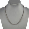 Men's vintage silver foxtail chain necklace displayed elegantly on a grey jewelry bust.