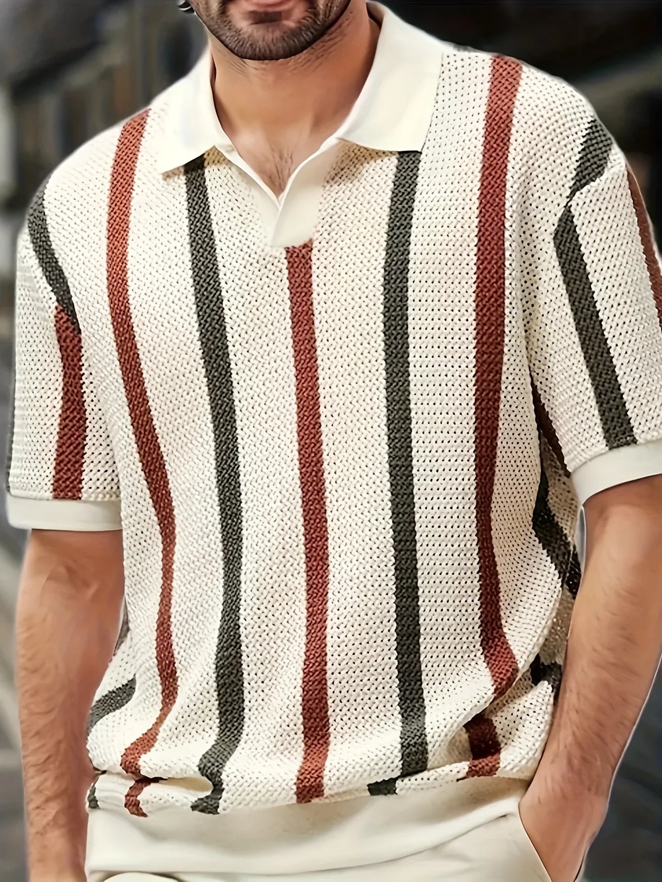 Front view of a model wearing the cream business casual lightweight striped knit polo shirt with an open V-neck