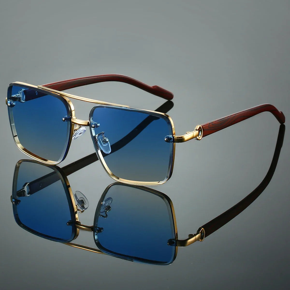 Retro square metal sunglasses with double bridge, wood temples, and mirrored dark blue lenses reflecting on a dark surface.