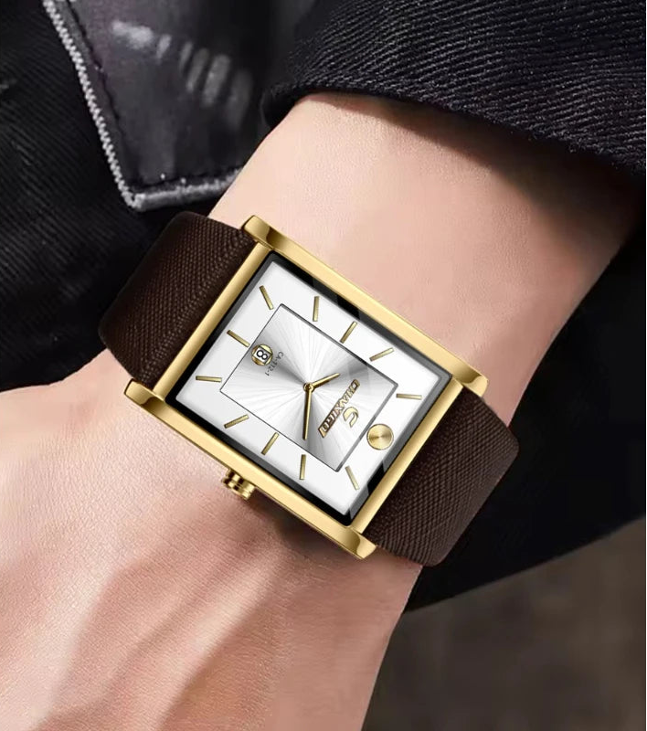 Model wearing a silver rectangular dress watch with a white dial and brown leather strap, styled with a dark shirt sleeve.