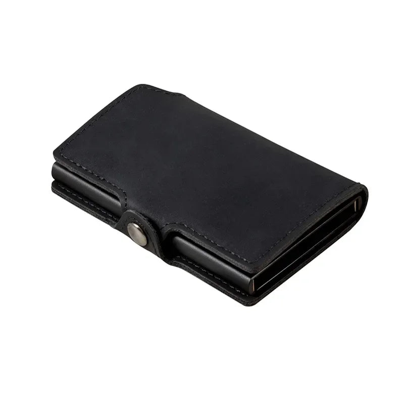 All-black vintage split leather smart wallet with a matching black metal pop-up card mechanism and secure hasp button