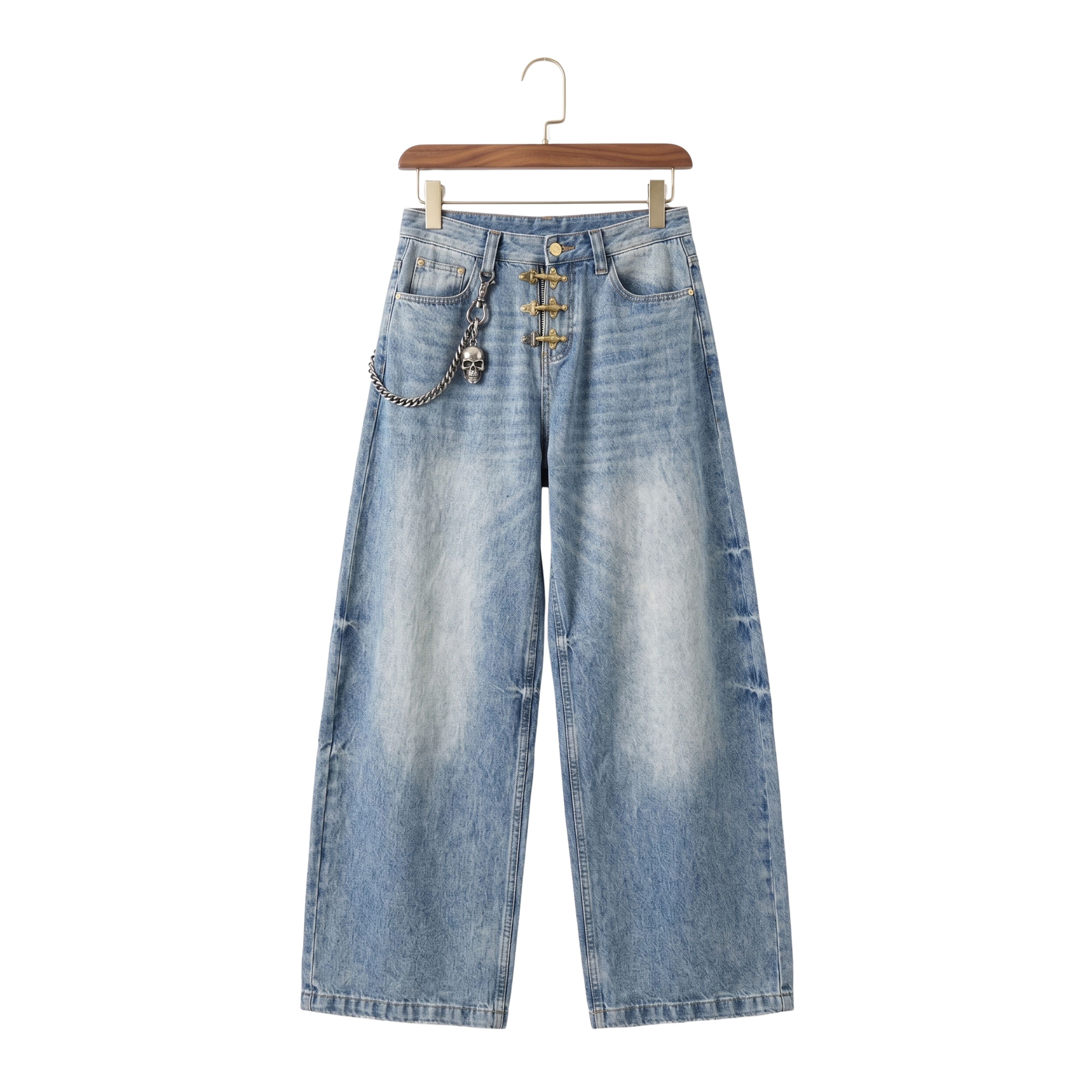 Light wash wide-leg baggy jeans by THE CREW featuring an offset asymmetrical button fly closure design